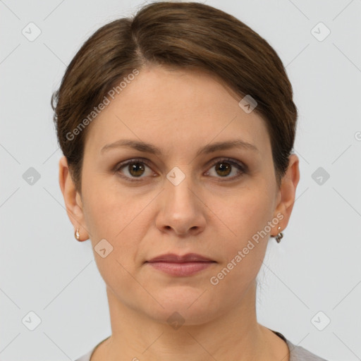 Joyful white young-adult female with short  brown hair and grey eyes