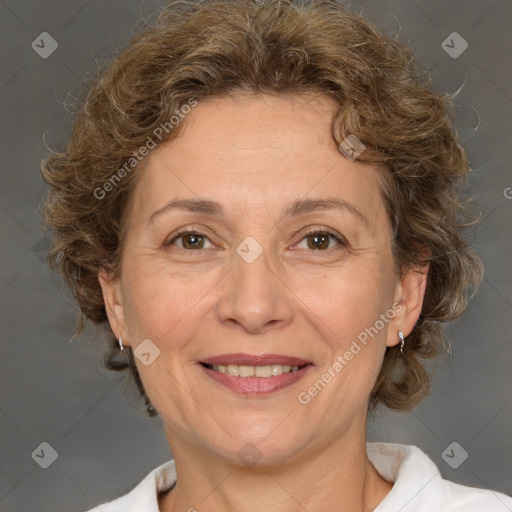 Joyful white middle-aged female with medium  brown hair and brown eyes