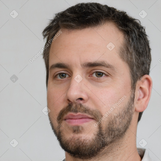 Neutral white young-adult male with short  brown hair and brown eyes