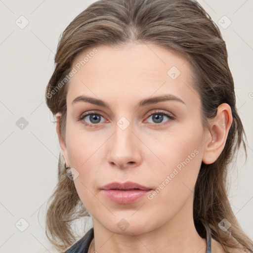 Neutral white young-adult female with medium  brown hair and grey eyes