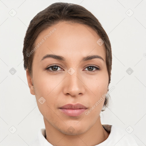 Neutral white young-adult female with short  brown hair and brown eyes