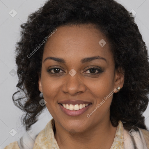 Joyful black young-adult female with long  brown hair and brown eyes