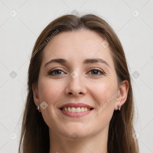 Joyful white young-adult female with long  brown hair and grey eyes