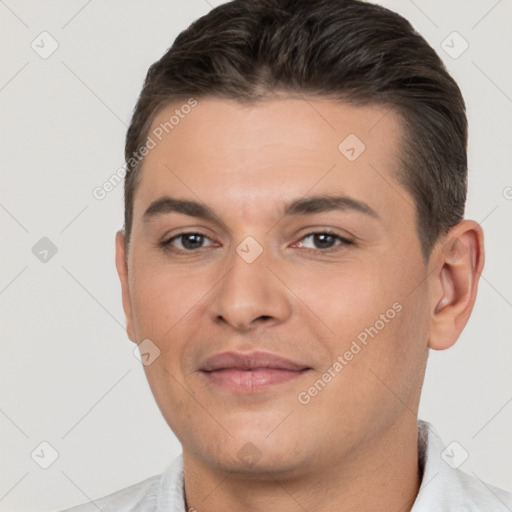 Joyful white young-adult male with short  brown hair and brown eyes