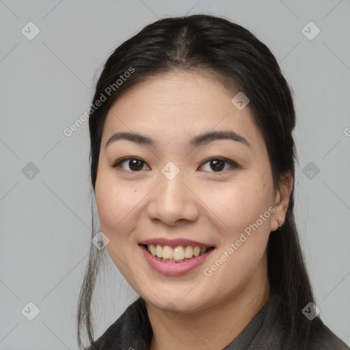 Joyful white young-adult female with medium  black hair and brown eyes