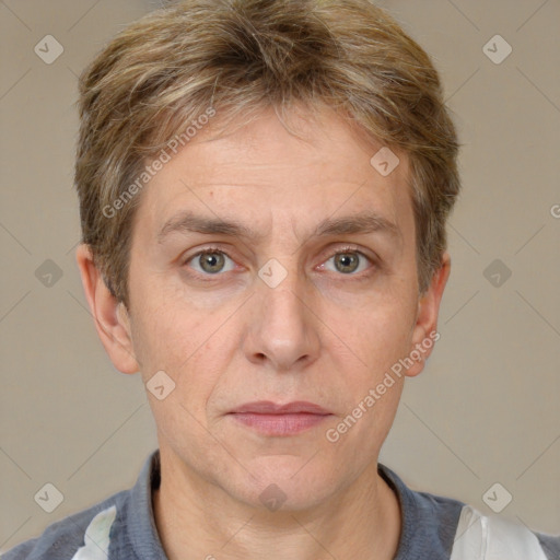 Joyful white adult male with short  brown hair and grey eyes