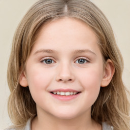 Joyful white child female with long  brown hair and grey eyes
