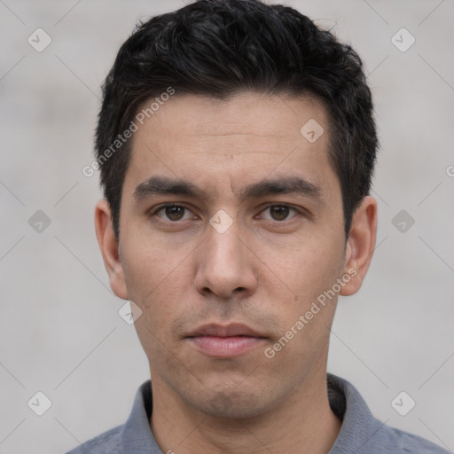 Neutral white young-adult male with short  black hair and brown eyes