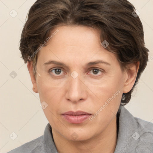 Joyful white adult female with short  brown hair and grey eyes