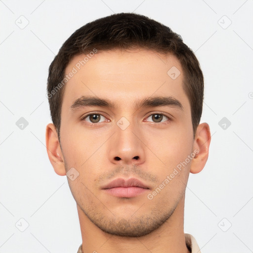 Neutral white young-adult male with short  brown hair and brown eyes