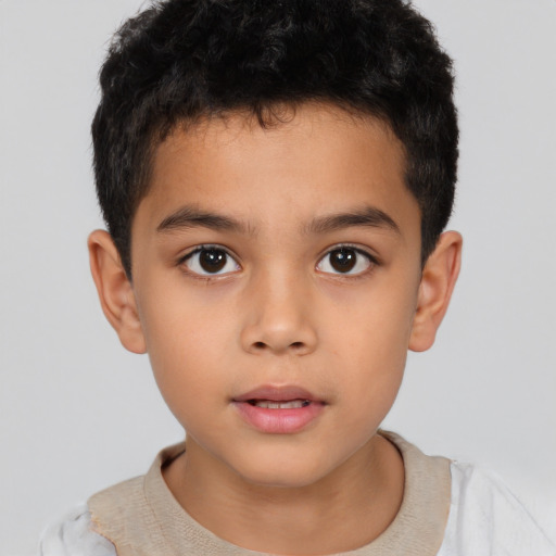 Neutral latino child male with short  brown hair and brown eyes