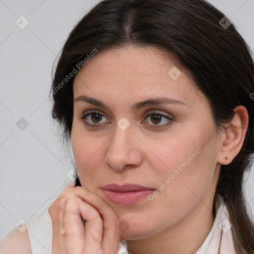 Joyful white young-adult female with medium  brown hair and brown eyes