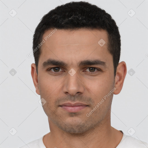 Neutral latino young-adult male with short  black hair and brown eyes