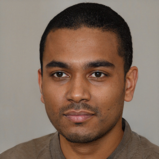 Neutral black young-adult male with short  black hair and brown eyes