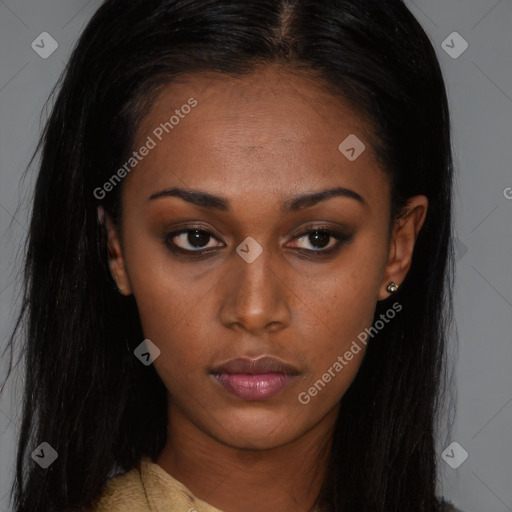 Neutral black young-adult female with long  brown hair and brown eyes