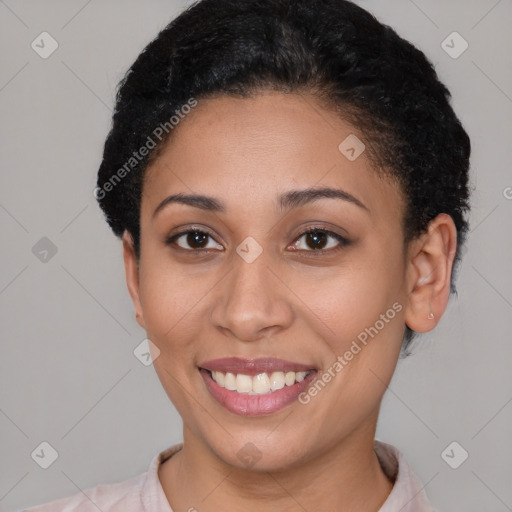 Joyful latino young-adult female with short  black hair and brown eyes