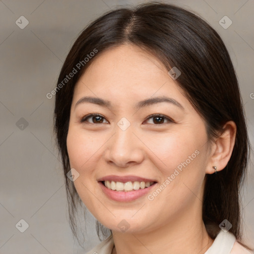 Joyful white young-adult female with medium  brown hair and brown eyes