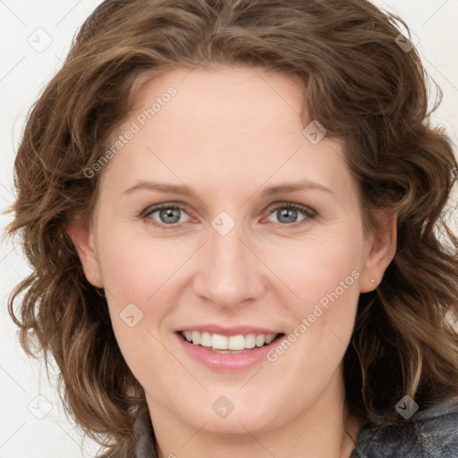 Joyful white young-adult female with medium  brown hair and blue eyes