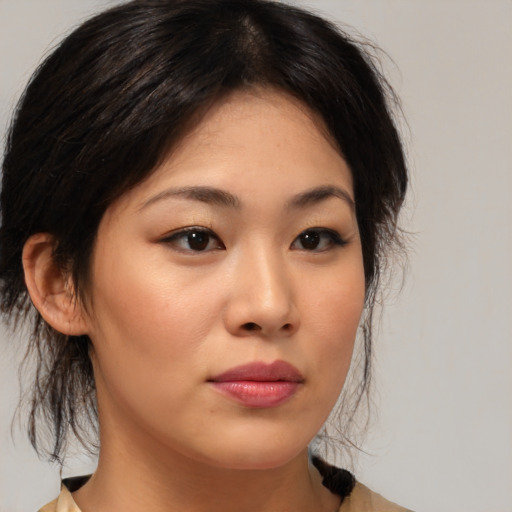 Neutral asian young-adult female with medium  brown hair and brown eyes