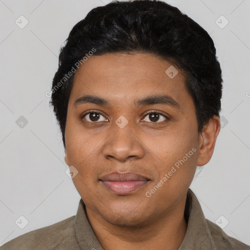 Joyful latino young-adult male with short  black hair and brown eyes