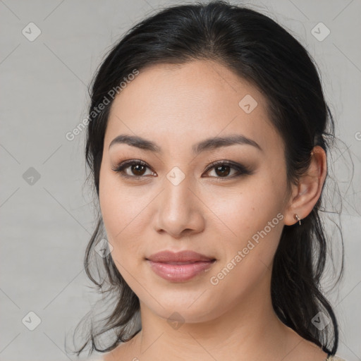 Joyful asian young-adult female with medium  brown hair and brown eyes