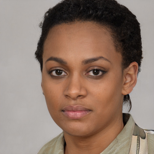 Neutral latino young-adult female with short  black hair and brown eyes