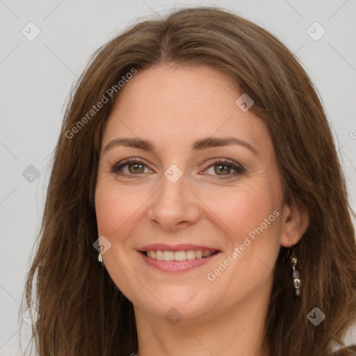 Joyful white young-adult female with long  brown hair and green eyes