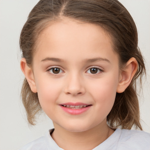 Joyful white child female with medium  brown hair and brown eyes