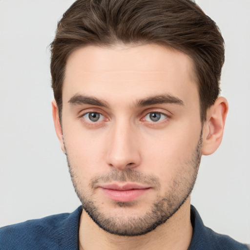 Neutral white young-adult male with short  brown hair and brown eyes