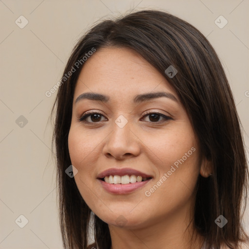 Joyful white young-adult female with long  brown hair and brown eyes