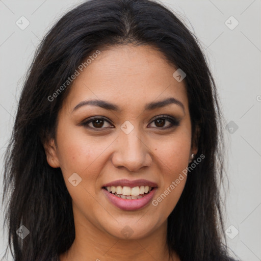 Joyful latino young-adult female with long  brown hair and brown eyes