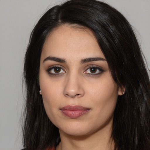 Neutral white young-adult female with long  black hair and brown eyes