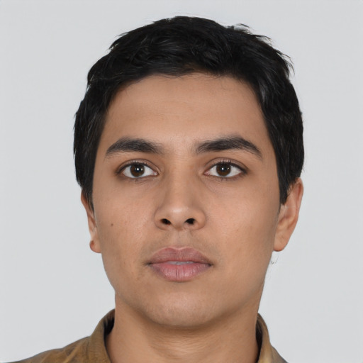 Neutral latino young-adult male with short  black hair and brown eyes