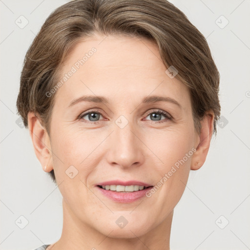 Joyful white young-adult female with short  brown hair and grey eyes