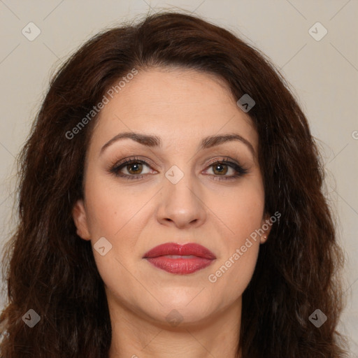 Joyful white adult female with long  brown hair and brown eyes