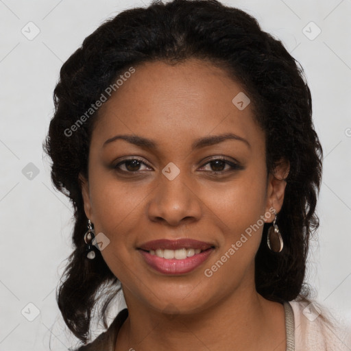 Joyful black young-adult female with long  brown hair and brown eyes