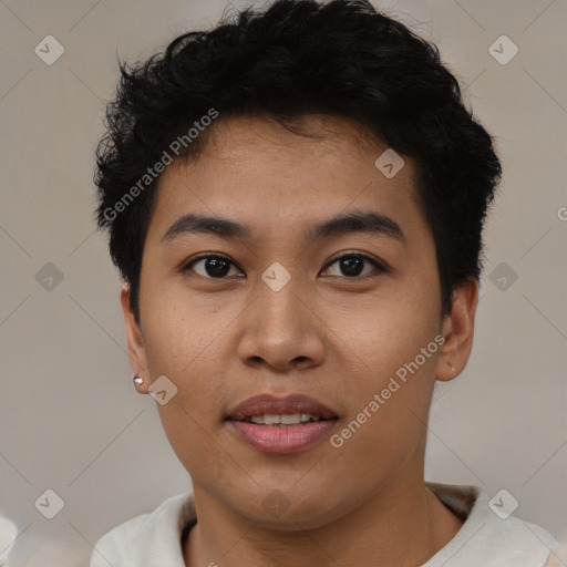 Joyful asian young-adult male with short  brown hair and brown eyes