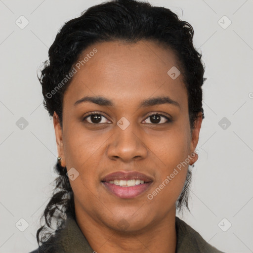 Joyful black young-adult female with short  black hair and brown eyes