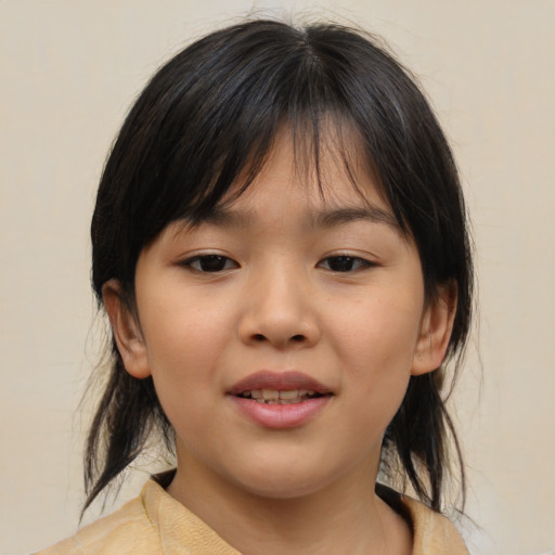 Joyful asian child female with medium  brown hair and brown eyes