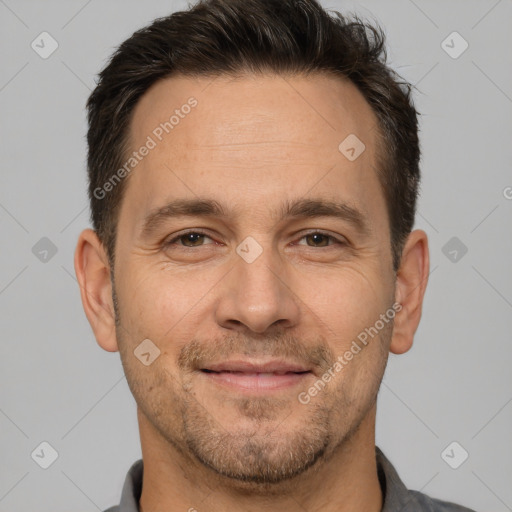 Joyful white adult male with short  brown hair and brown eyes