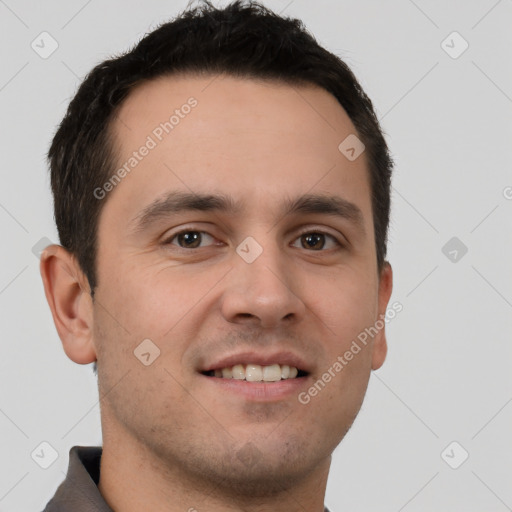 Joyful white young-adult male with short  brown hair and brown eyes