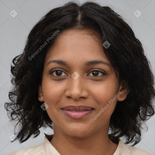 Joyful black young-adult female with medium  brown hair and brown eyes