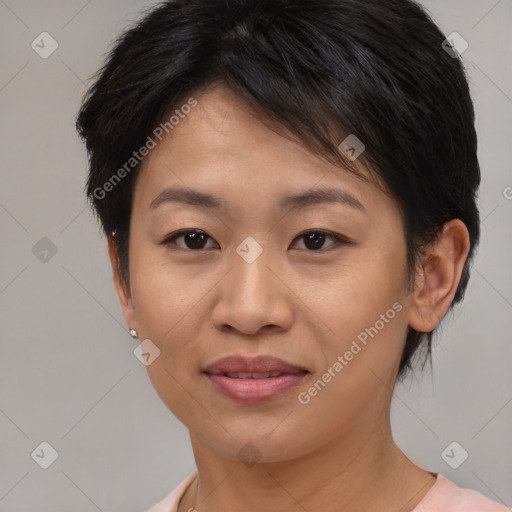 Joyful asian young-adult female with short  brown hair and brown eyes