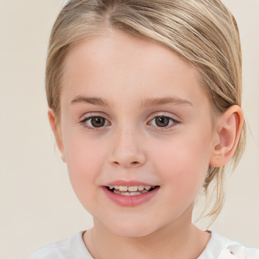 Joyful white child female with medium  brown hair and grey eyes