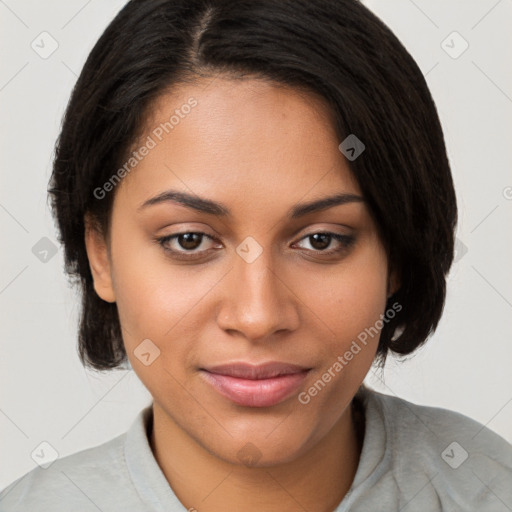 Joyful latino young-adult female with medium  brown hair and brown eyes