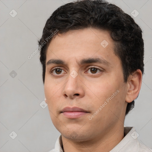 Neutral white young-adult male with short  brown hair and brown eyes