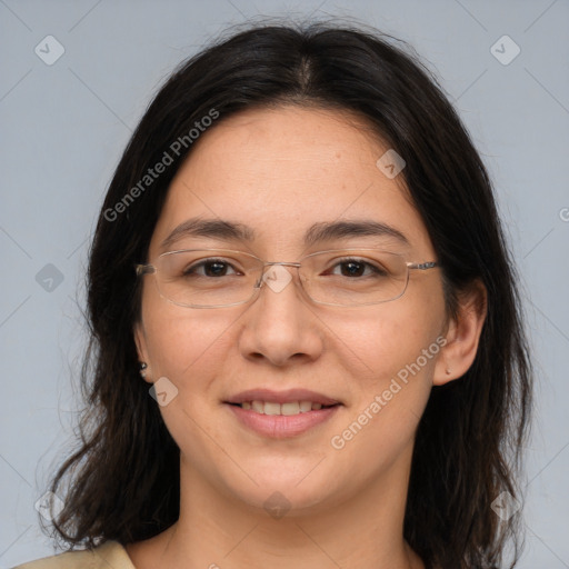 Joyful white adult female with medium  brown hair and brown eyes