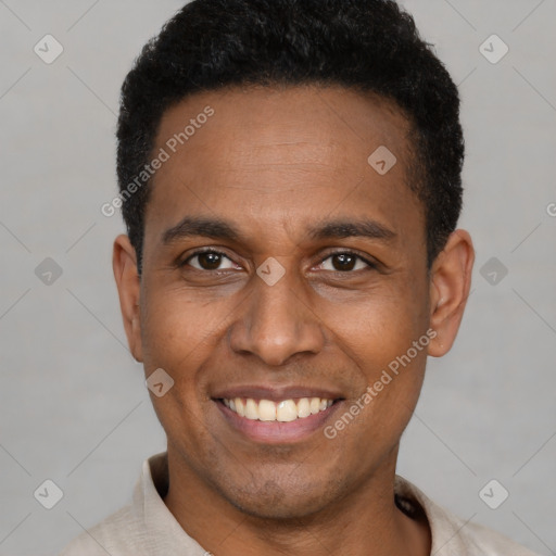 Joyful latino young-adult male with short  black hair and brown eyes