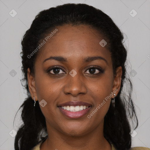 Joyful black young-adult female with medium  brown hair and brown eyes