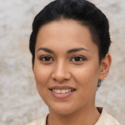 Joyful latino young-adult female with short  brown hair and brown eyes